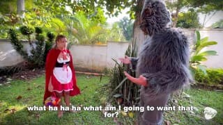 Little Red Riding Hood lost a fruit from her basket and is looking for it in the wolf's pants.